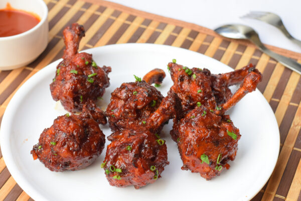 High angle shot of delicious hot and spicy dish called Drums of heaven on the table CHICKEN MANCHURIA