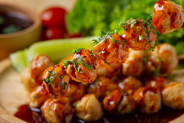 Pork meatballs on the wooden background. GOBI MANCHURIA
